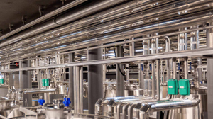 Choosing between spool assemblies and sanitary tubing in brewing setups..jpg